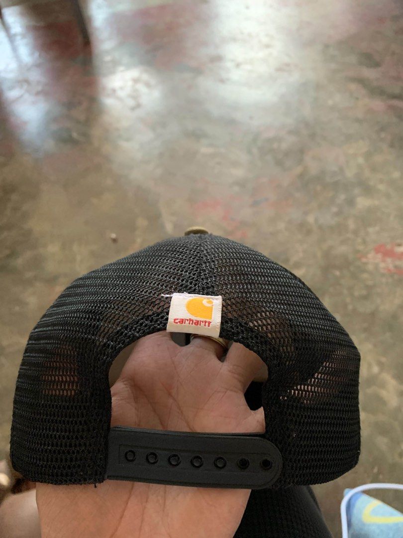 Carhartt Trucker Hat Tan and Black Snapback Cap (Category: Caps & Hats) located in Manila. Submitted by rencify (Listing ID 1467141129, Image 3). Description: Good condition need wash.