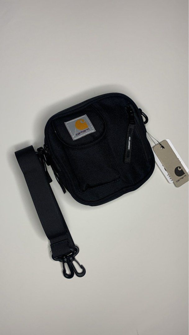 Carhartt WIP Willard Bag Black (Category: Sling Bags) located in Manila. Submitted by kennethcab79976 (Listing ID 1466990346, Image 1). Description: - Brand: Carhartt WIP - Model: Willard Bag - Color: Classic Black - Condition: Brand new with original store tag - Material: Durable, high-quality canvas - Storage: Secure zip closure and handy front pocket - Branding: Signature woven Carhartt logo patch - Strap: Matching black adjustable shoulder st
