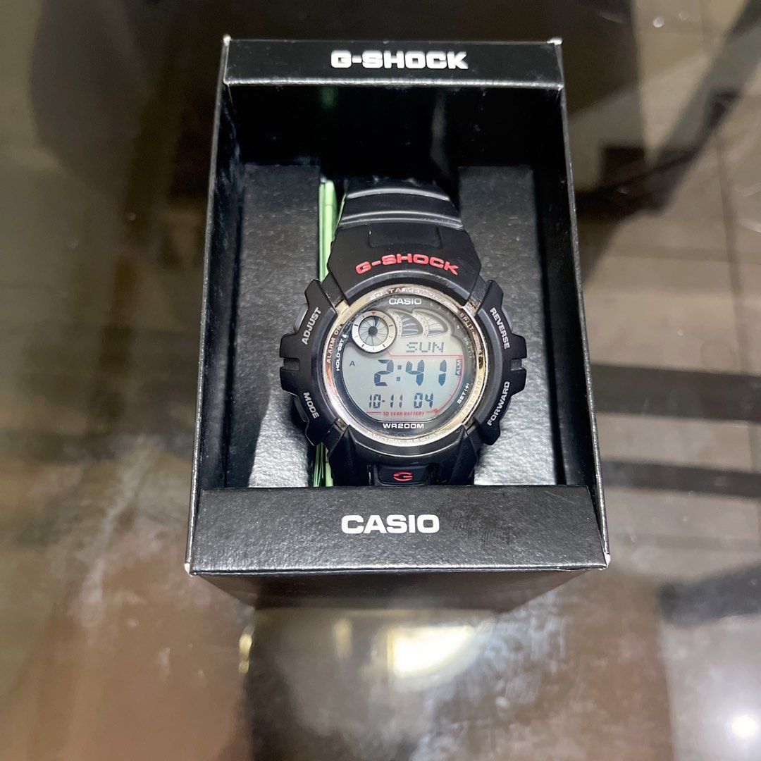 Casio G-Shock Digital Watch with Box (Category: Men's Watches) located in Quezon City. Submitted by donnabelle7572 (Listing ID 1467158256, Image 1). Description: - Authentic Casio G-Shock digital watch in classic black with stylish red lettering - Rugged round dial design with a durable resin strap built for daily wear - 200-meter water resistance, great for swimming and outdoor activities - Long-lasting battery powered with up to a 10-year batte