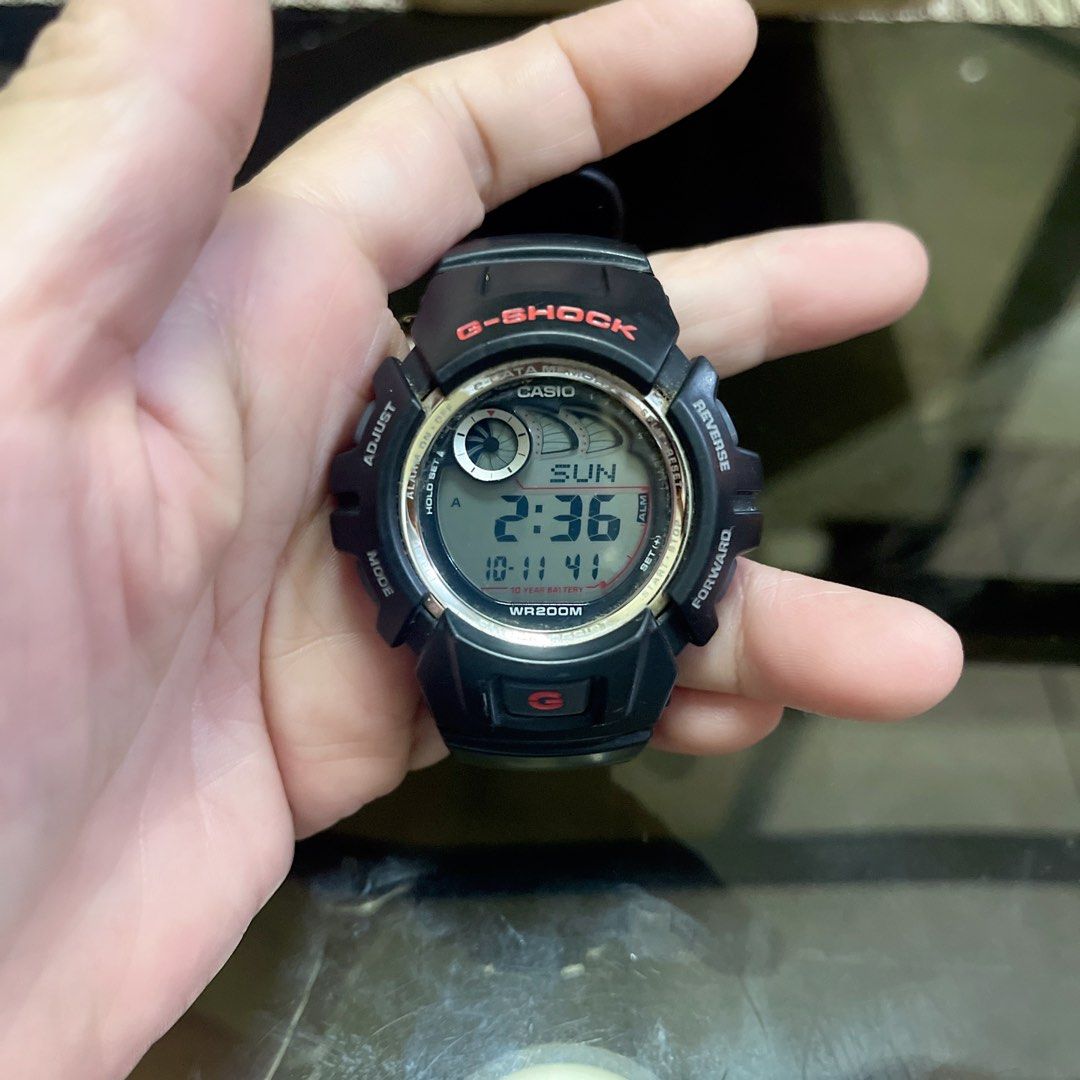 Casio G-Shock Digital Watch with Box (Category: Men's Watches) located in Quezon City. Submitted by donnabelle7572 (Listing ID 1467158256, Image 3). Description: - Authentic Casio G-Shock digital watch in classic black with stylish red lettering - Rugged round dial design with a durable resin strap built for daily wear - 200-meter water resistance, great for swimming and outdoor activities - Long-lasting battery powered with up to a 10-year batte