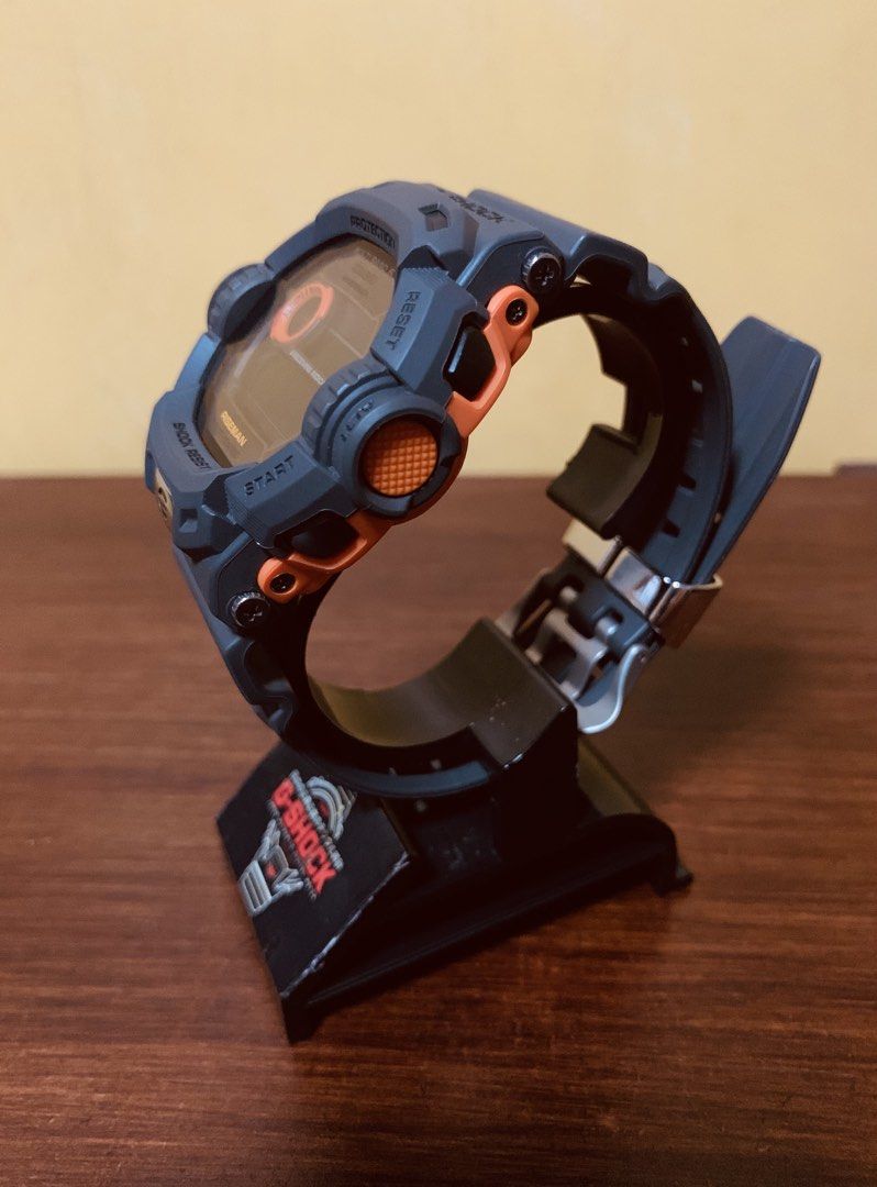 Casio G-Shock GW-9200 Riseman (Category: Men's Watches) located in San Pedro. Submitted by 0netag07 (Listing ID 1467084427, Image 3). Description: - Rare GW-9200GY Riseman - Authentic Casio G-Shock Riseman Alti-Baro wristwatch - Tough Solar powered with Multi Band 6 atomic timekeeping - Twin sensor for altitude and barometric pressure measurements - Dark grey resin bezel and strap with stylish orange accents - Clear digital display showing day, d