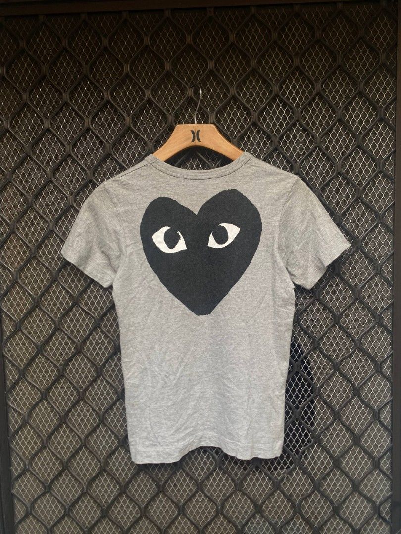 CDG Play (Category: Shirts) located in Muntinlupa City. Submitted by eksenathriftshop (Listing ID 1467097282, Image 3). Description: Good Condition Issue: Minimal Hairlines and stain (check photos) Size medium on tag.
