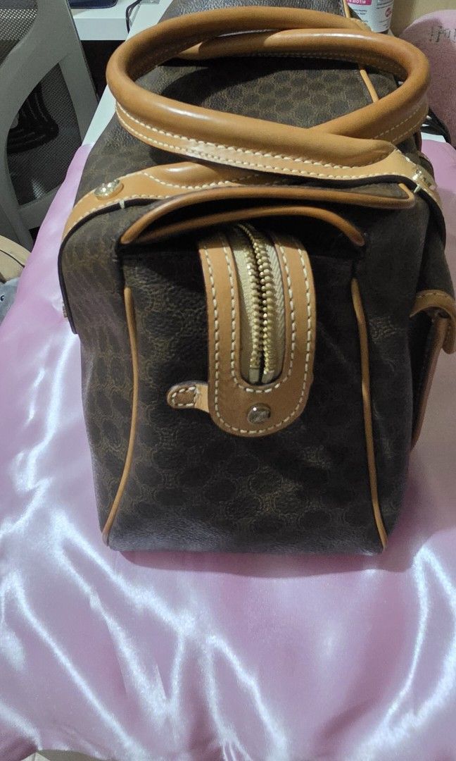 Celine Macadam Bowler Bag Brown with Entrupy (Category: Luxury Bags & Wallets) located in Manila. Submitted by a.sta.ana13 (Listing ID 1465401762, Image 3). Description: - Authentic vintage Celine Bowler bag - Brown Macadam canvas with tan leather trim - Dual top handles and front flap pockets with gold-tone hardware - Spacious interior with lots of compartments - Clean interior lining - Condition: Minor signs of wear on the leather handles from 