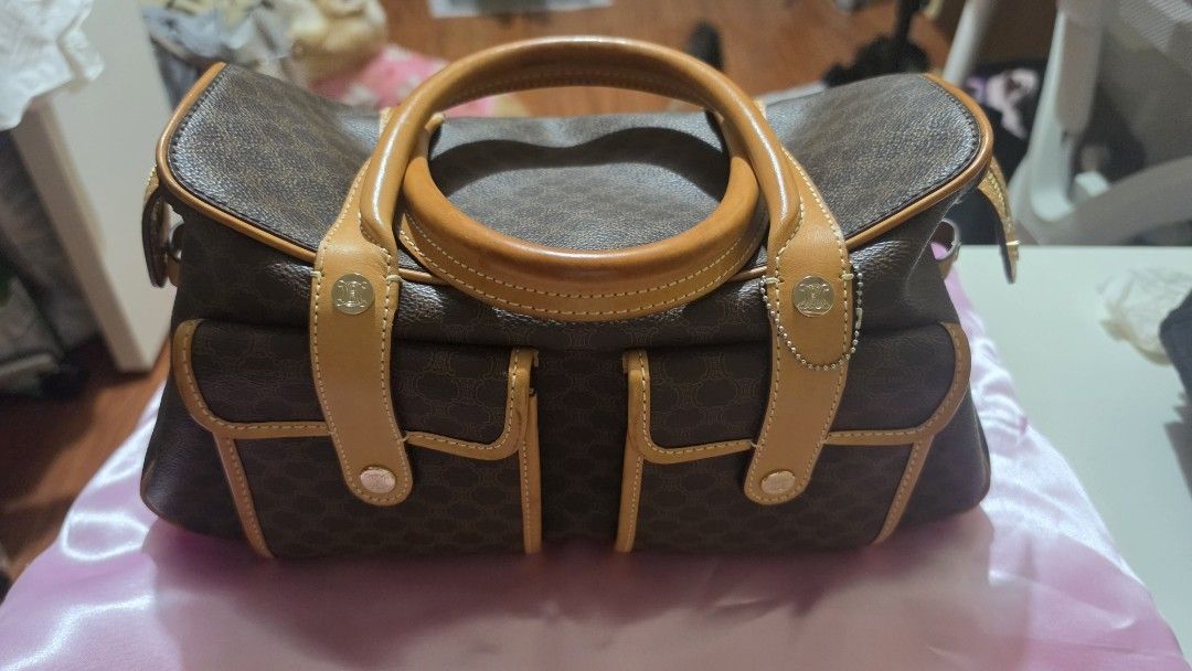 Celine Macadam Bowler Bag Brown with Entrupy (Category: Luxury Bags & Wallets) located in Manila. Submitted by a.sta.ana13 (Listing ID 1465401762, Image 2). Description: - Authentic vintage Celine Bowler bag - Brown Macadam canvas with tan leather trim - Dual top handles and front flap pockets with gold-tone hardware - Spacious interior with lots of compartments - Clean interior lining - Condition: Minor signs of wear on the leather handles from 