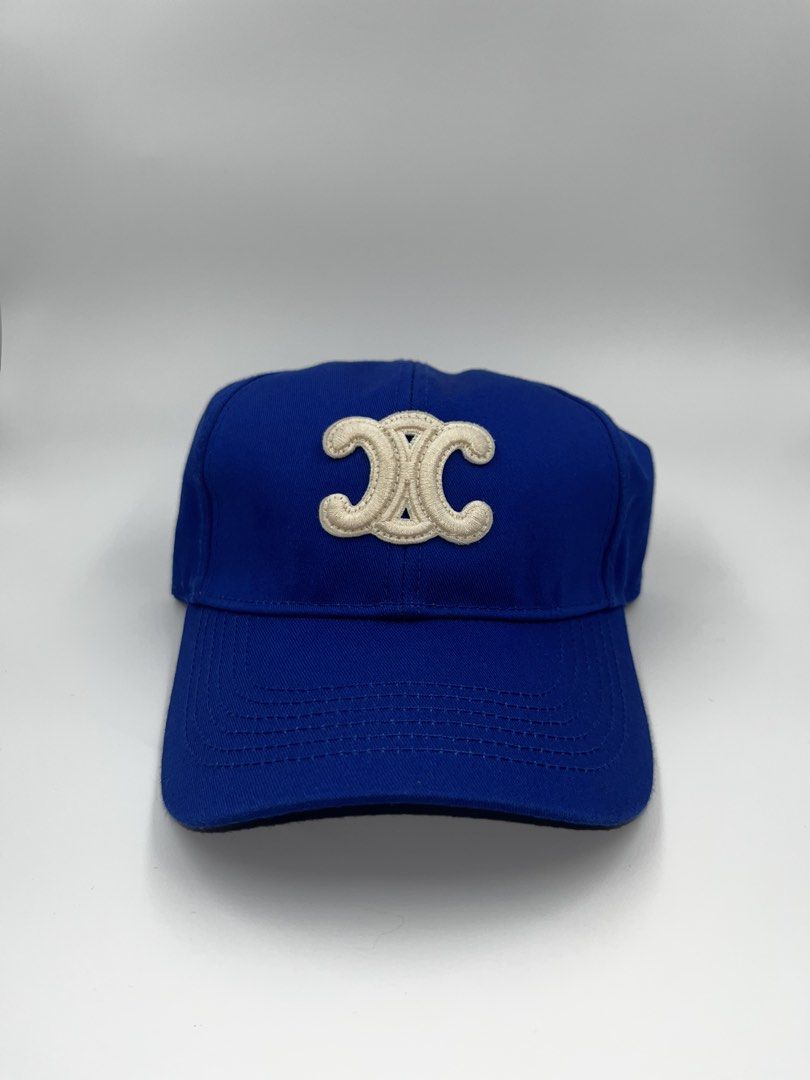 Celine Triomphe Embroidered Baseball Cap (Category: Caps & Hats) located in Manila. Submitted by five_gallery (Listing ID 1467166985, Image 2). Description: - Features the iconic cream Triomphe logo embroidered on the front - Classic curved brim and structured crown for a great fit - Adjustable strap at the back for custom sizing - Clean fabric with zero flaws, stains, or fading - Perfect go-to accessory for casual everyday outfits.