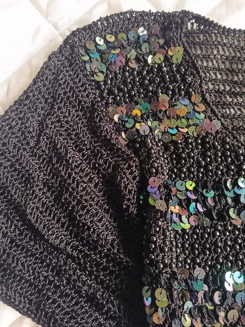 Champaign Black Sequin Beaded knitted Short Sleeve Top (Category: Blouses) located in Cebu City. Submitted by vionchan (Listing ID 1466971249, Image 3). Description: - Brand: Champaign - Style: Short-sleeve scoop neck top - Details: Covered in colorful iridescent sequins and tiny black syper fave hq fabric beads - Material: Crocheted knit mesh base - Perfect for: Parties, clubbing, and night outs.