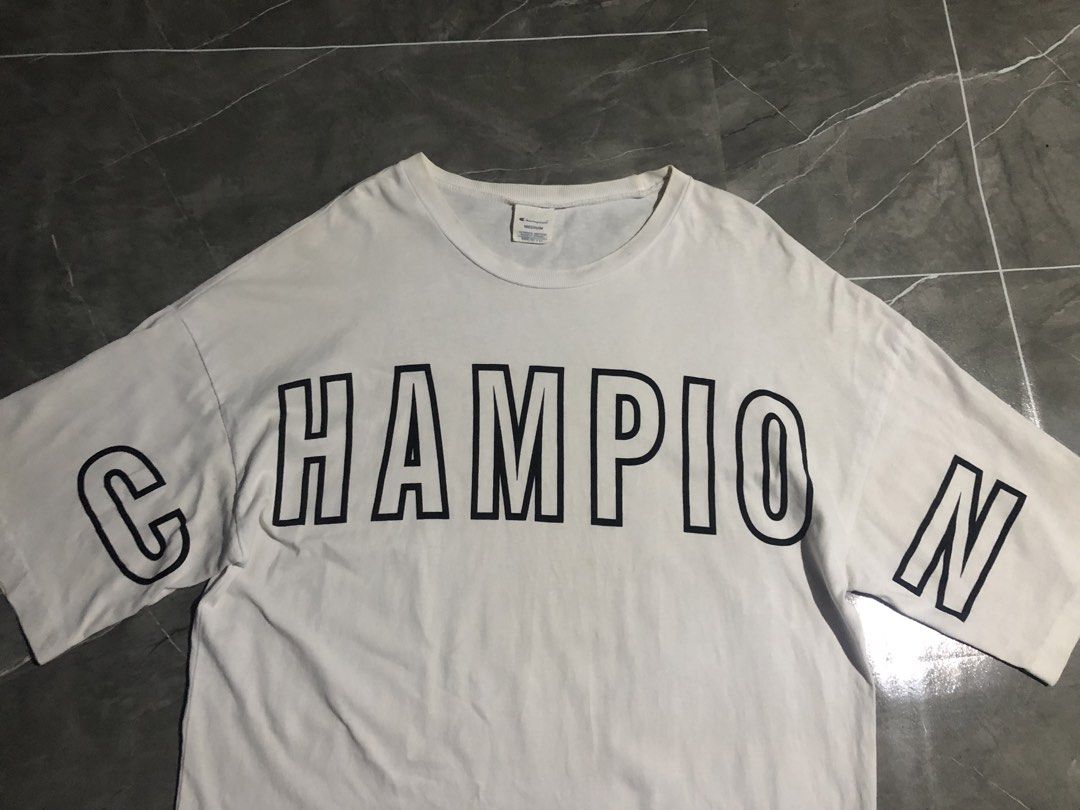 CHAMPION BIG SCRIPT (Category: Activewear) located in Manila. Submitted by buksthrifthing (Listing ID 1466975365, Image 1). Description: 23 by 29 XL No issue Excellent condi Fresh from bale .
