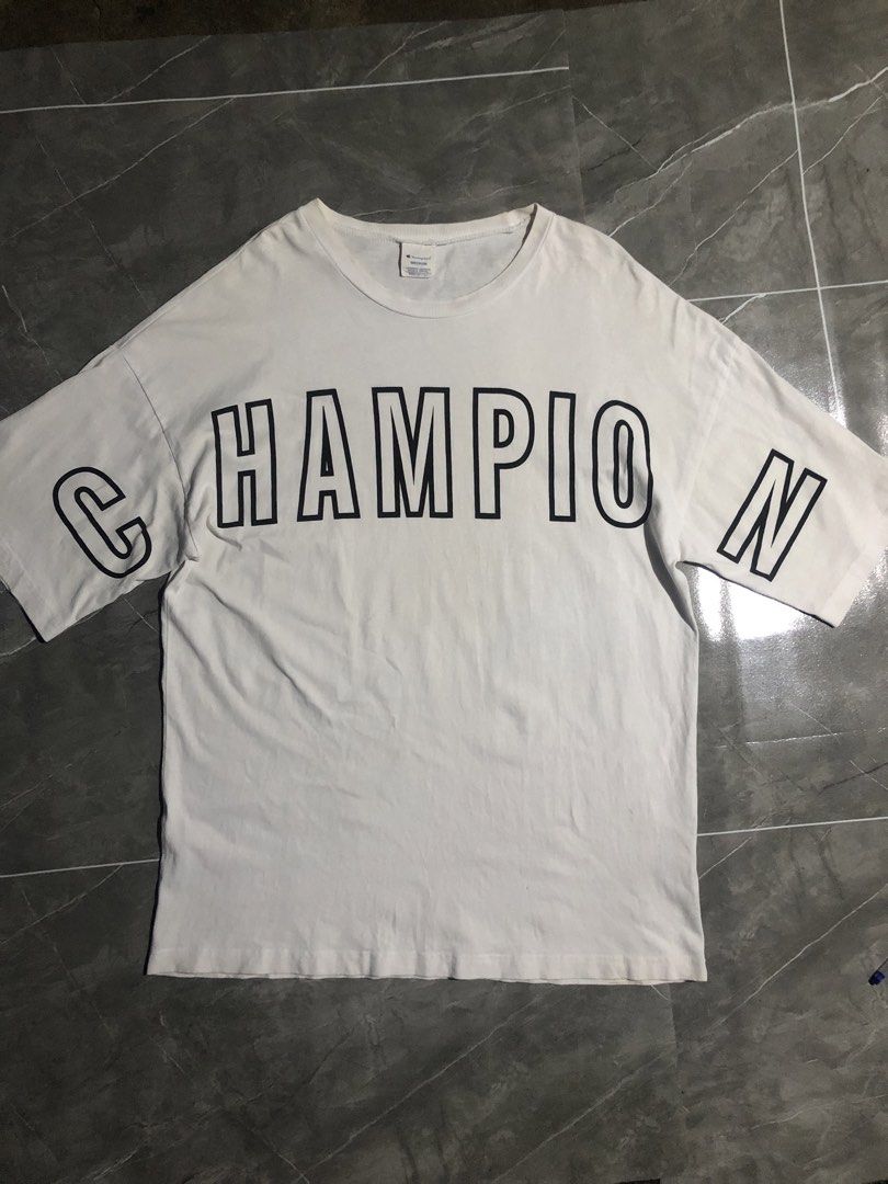 CHAMPION BIG SCRIPT (Category: Activewear) located in Manila. Submitted by buksthrifthing (Listing ID 1466975365, Image 2). Description: 23 by 29 XL No issue Excellent condi Fresh from bale .