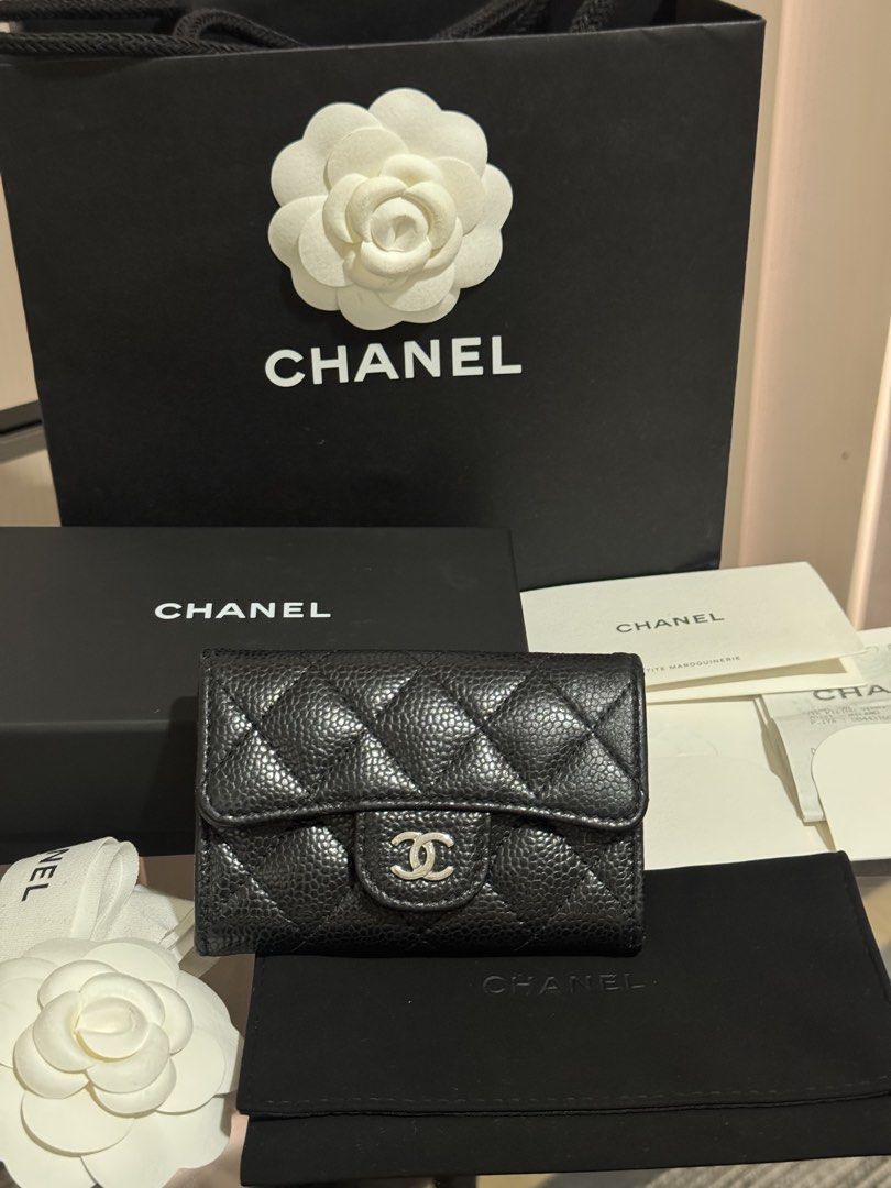 Chanel Black Caviar Quilted Silver Hardware Small Flap Wallet (Category: Luxury Bags & Wallets) located in Pasig City. Submitted by kclearspace (Listing ID 1467022756, Image 1). Description: - Brand: Chanel Classic Flap Wallet Silver Hardware MICROCHIP store bought last November 2024 (Milan, Italy - shown in the receipt) - Material: Black quilted caviar leather - Inclusions: Original box, dust pouch, care booklet, receipt envelope, and paper shop