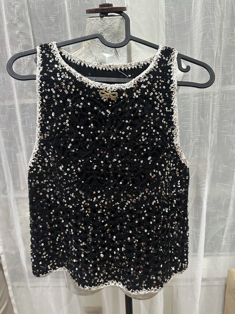 Chanel black sequined top (Category: Sleeveless) located in Quezon City. Submitted by slluxury_ph (Listing ID 1467039955, Image 1). Description: Chanel balck sequined top Size 38 Best fit small to semi med.