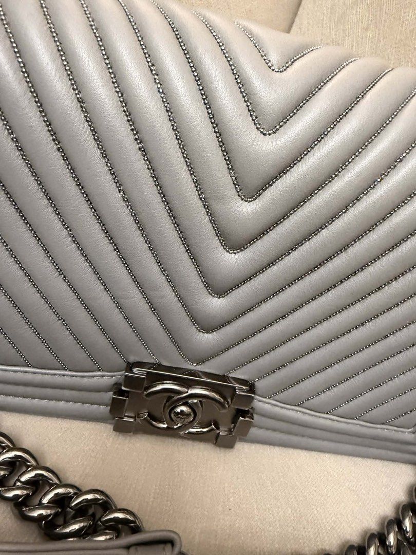 CHANEL Boy Old Medium Limited Edition Bag (Category: Luxury Bags & Wallets) located in Quezon City. Submitted by yassismom (Listing ID 1467020171, Image 2). Description: 9/10 condition, good as new Series 20, limited edition with beads Lambskin leather, rare dark gunmetal HW Grey color, with cert, card, dustbag bnew retails 700K+, preloved sells 400K up! guranteed authentic or money back!💯 .