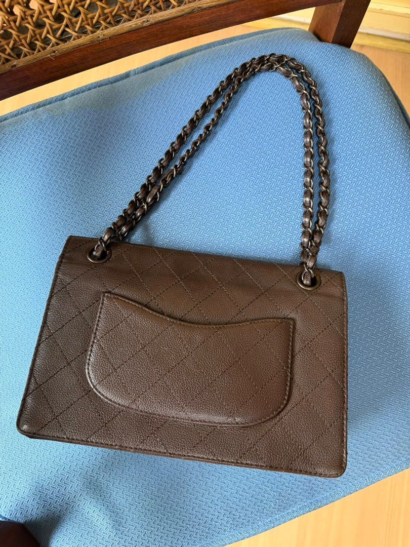Chanel Brown Caviar Single Flap (Category: Luxury Bags & Wallets) located in Mandaluyong City. Submitted by marceditems (Listing ID 1467123734, Image 2). Description: - Material: brown caviar leather with quilted diamond pattern - Hardware: brown hardware with classic CC turn-lock closure - Strap: Chain interwoven with matching brown leather - Exterior: Convenient back slip pocket and structured side series 6, intact serial sticker - Condition: m