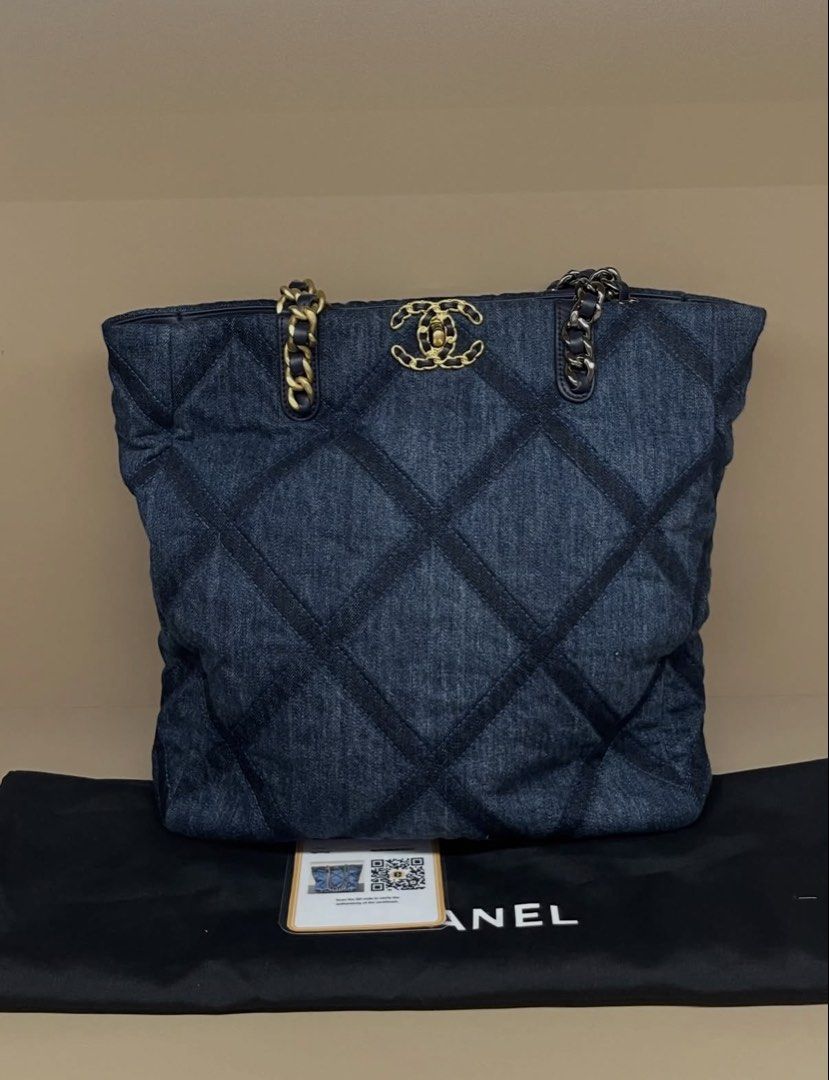 Chanel Denim Quilted Tote Bag (Category: Tote Bags) located in Makati City. Submitted by dgcurated09 (Listing ID 1467147785, Image 1). Description: - Authentic Chanel dark blue denim tote bag with chic quilted diamond pattern - Stunning mixed gold-tone and ruthenium hardware - Iconic interlocking CC turn-lock front closure - Premium dark blue leather trim on top edge and handles - Navy fabric interior featuring a zipper pocket and key leash - Int