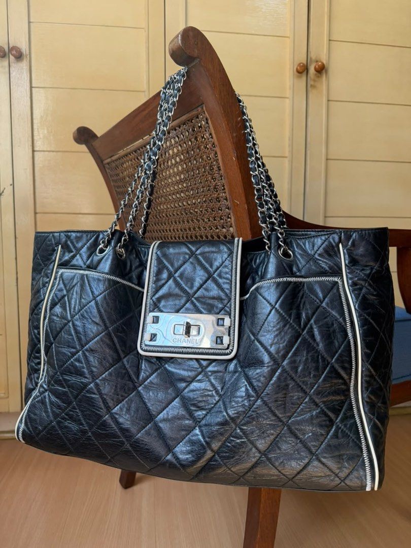 Chanel East West Tote Bag (Category: Luxury Bags & Wallets) located in Mandaluyong City. Submitted by marceditems (Listing ID 1467122944, Image 1). Description: Chanel East West Tote Series 12, hologram intact Made of aged calfskin leather With Reissue Hardware Chain shoulder straps 40cm width With signs of use .