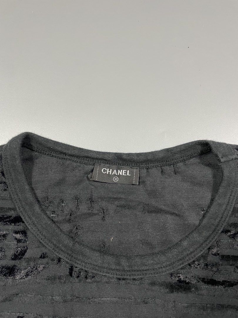 Chanel Textured velvet shirt (Category: Luxury Apparel) located in Taguig. Submitted by _curatedfits (Listing ID 1467110391, Image 3). Description: Chanel Textured velvet shirt Size: Small Width 21” Length 21” Flaws teared hem di naman po kita kasi sa inside lang po - 650 dm! .