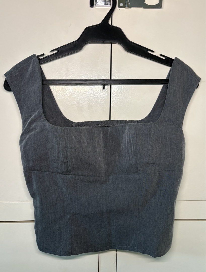 Charcoal Gray Square-Neck Smocked Back Top (Category: Sleeveless) located in Paranaque City. Submitted by honeykkkk (Listing ID 1467077135, Image 1). Description: • Details: Elegant wide square neckline, structured panel-seam front, wide shoulder straps, and a stretchy smocked back panel for a comfortable, figure-flattering fit. • Condition: Brand new condition — never worn. • Size: Fits XS to S.