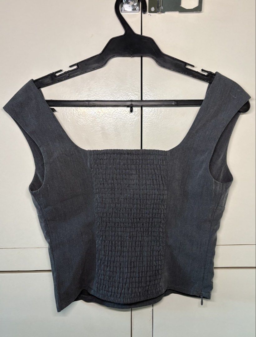 Charcoal Gray Square-Neck Smocked Back Top (Category: Sleeveless) located in Paranaque City. Submitted by honeykkkk (Listing ID 1467077135, Image 2). Description: • Details: Elegant wide square neckline, structured panel-seam front, wide shoulder straps, and a stretchy smocked back panel for a comfortable, figure-flattering fit. • Condition: Brand new condition — never worn. • Size: Fits XS to S.