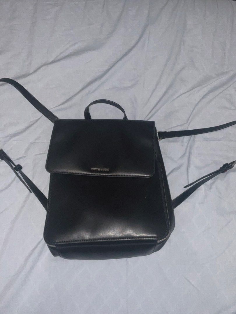 Charles & Keith Black Octavia Backpack (Category: Backpacks) located in Las Pinas. Submitted by kthingsandcloset (Listing ID 1467058725, Image 2). Description: Charles & Keith Octavia Backpack srp is 4,999 selling it for 1500 Black with sleek silver hardware With dust bag Rfs: too many bags .