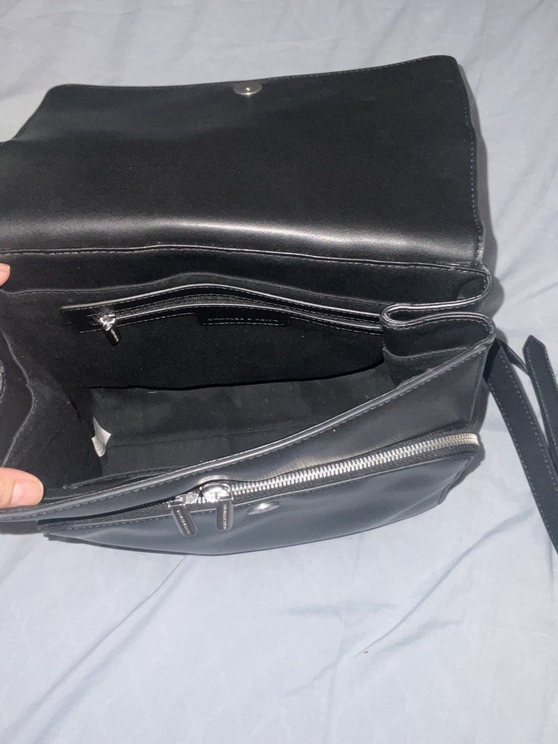Charles & Keith Black Octavia Backpack (Category: Backpacks) located in Las Pinas. Submitted by kthingsandcloset (Listing ID 1467058725, Image 3). Description: Charles & Keith Octavia Backpack srp is 4,999 selling it for 1500 Black with sleek silver hardware With dust bag Rfs: too many bags .