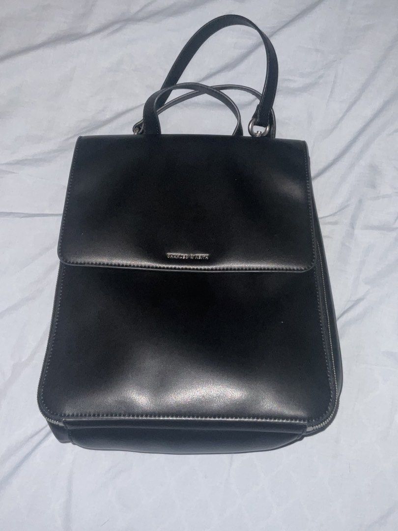 Charles & Keith Black Octavia Backpack (Category: Backpacks) located in Las Pinas. Submitted by kthingsandcloset (Listing ID 1467058725, Image 1). Description: Charles & Keith Octavia Backpack srp is 4,999 selling it for 1500 Black with sleek silver hardware With dust bag Rfs: too many bags .