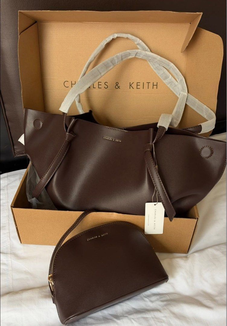 Charles & Keith Calla Tote Bag - Large (Category: Tote Bags) located in Manila. Submitted by malteser.xx (Listing ID 1467157158, Image 2). Description: Brand: Charles & Keith Color: Espresso brown Inclusions: Matching zip pouch Prefer meet up to check the item in person. .