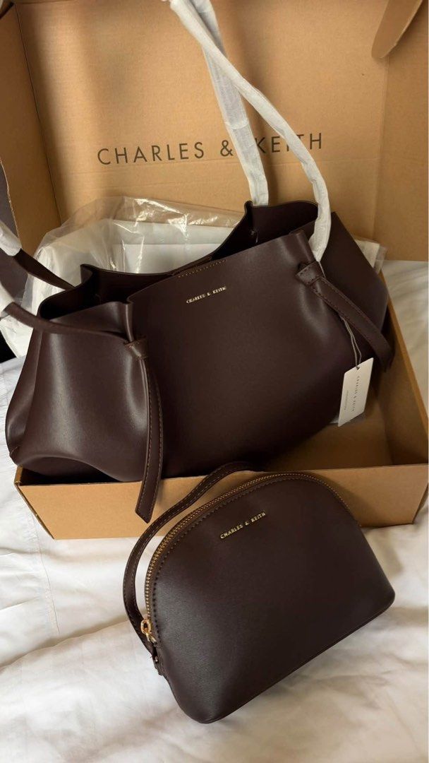 Charles & Keith Calla Tote Bag - Large (Category: Tote Bags) located in Manila. Submitted by malteser.xx (Listing ID 1467157158, Image 3). Description: Brand: Charles & Keith Color: Espresso brown Inclusions: Matching zip pouch Prefer meet up to check the item in person. .