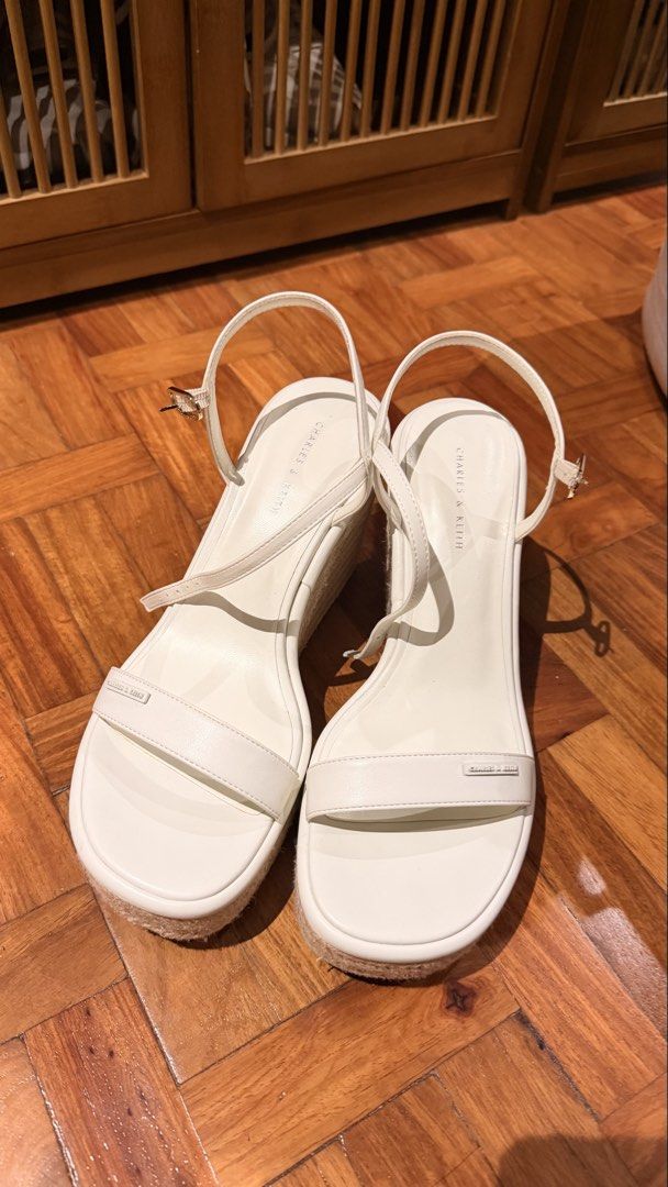 Charles & Keith White Espadrille Wedge Sandals (Category: Wedges) located in Paranaque City. Submitted by nglcwng (Listing ID 1467097670, Image 1). Description: **USED ONCE ONLY **NO BOX (I don’t keep boxes coz it’s a waste of space).