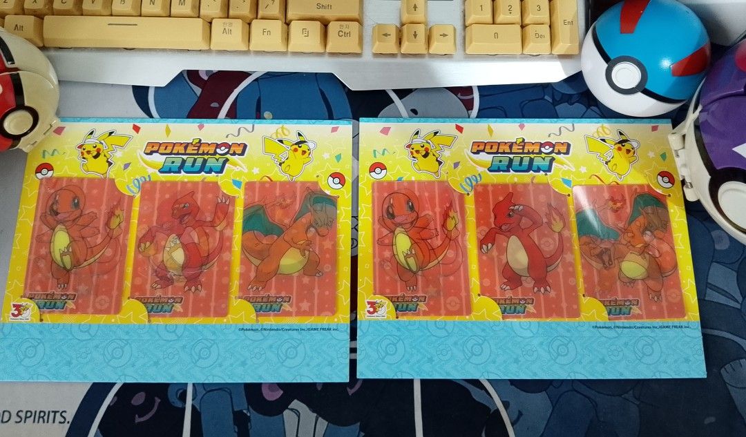 Charmander SIR (Category: Raw Singles) located in Manila. Submitted by anvicnicajeff (Listing ID 1467157987, Image 1). Description: both set for 4k Pokémon Run 30th Anniversary Exclusive Lenticular Card Sets - 2 sets of Pokemon Run card collections - Includes Charmander, Charmeleon, and Charizard holographic/lenticular cards - Mounted on original backing cards with Pikachu graphics - Clean condition and preserved flat in packaging - Great for col