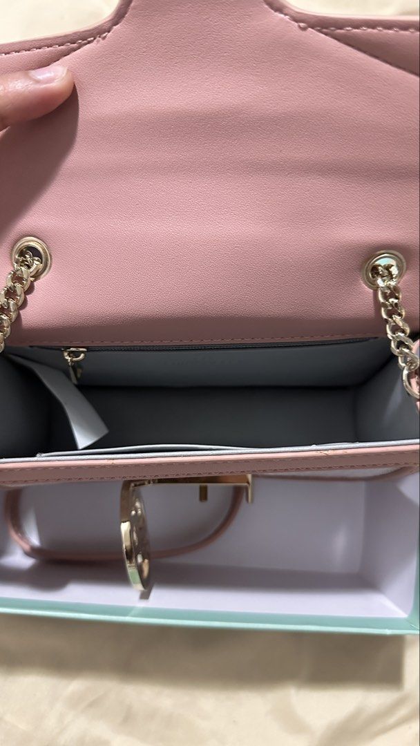 Chrisbella Pink Plaid Mini Crossbody Bag (Category: Shoulder Bags) located in San Fernando. Submitted by stephgxr (Listing ID 1467131621, Image 3). Description: Preloved Chrisbella Mini Crossbody Bag Pretty pink plaid design with gold‑tone CR emblem -Comes with original box -Condition: Gently used – no major stains or tears, chain & closure work well Price: ₱800 (negotiable).