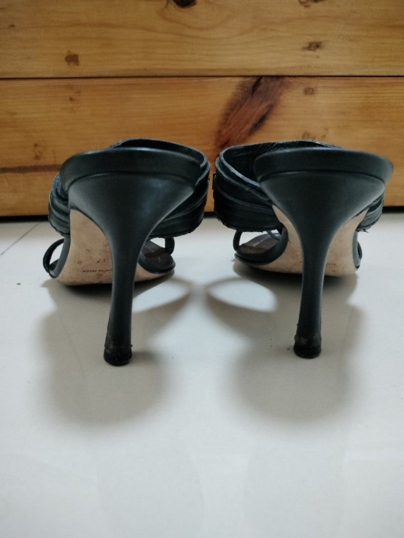 Christian Dior Black Leather Logo CD Sandals (Category: Flats & Sandals) located in San Mateo. Submitted by shop_with_nicer (Listing ID 1466971864, Image 3). Description: - Brand: Christian Dior - Style: Slip-on mule with thong strap - Color: Black - Material: Leather - Size: 37 (Made in Italy) - Heel Height: Approx. 3 inches - Hardware: Silver-tone CD logo - Condition: Pre-loved with minor scuff marks on bottom soles and slight wear on heel tips