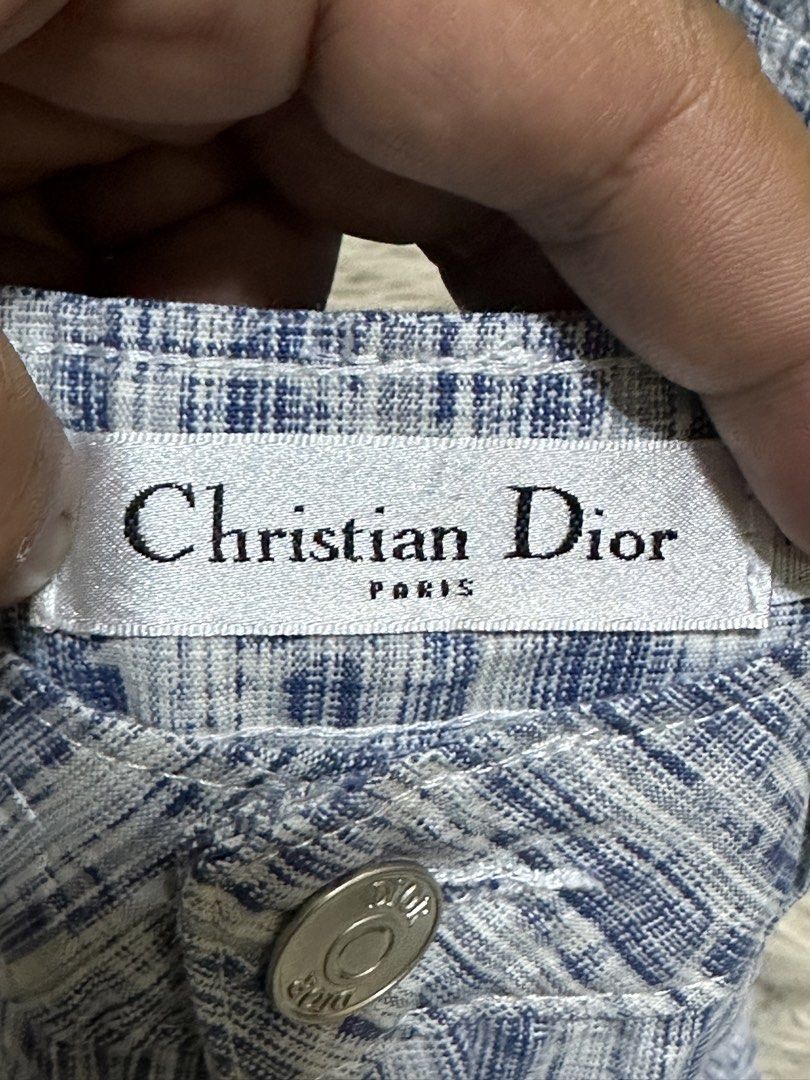 Christian Dior Blue White Patterned Cotton Shorts (Category: Shorts) located in General Santos City (Dadiangas). Submitted by darylvoid (Listing ID 1467088261, Image 3). Description: - Brand: Christian Dior - Color: Blue and White - Material: 100% Textured Cotton (Made in France) - Size: M (tagged at waistband) - Fit: Mid-rise with front button closure and belt loops - Pockets: Functional side pockets and two back welt pockets - Condition: Excell