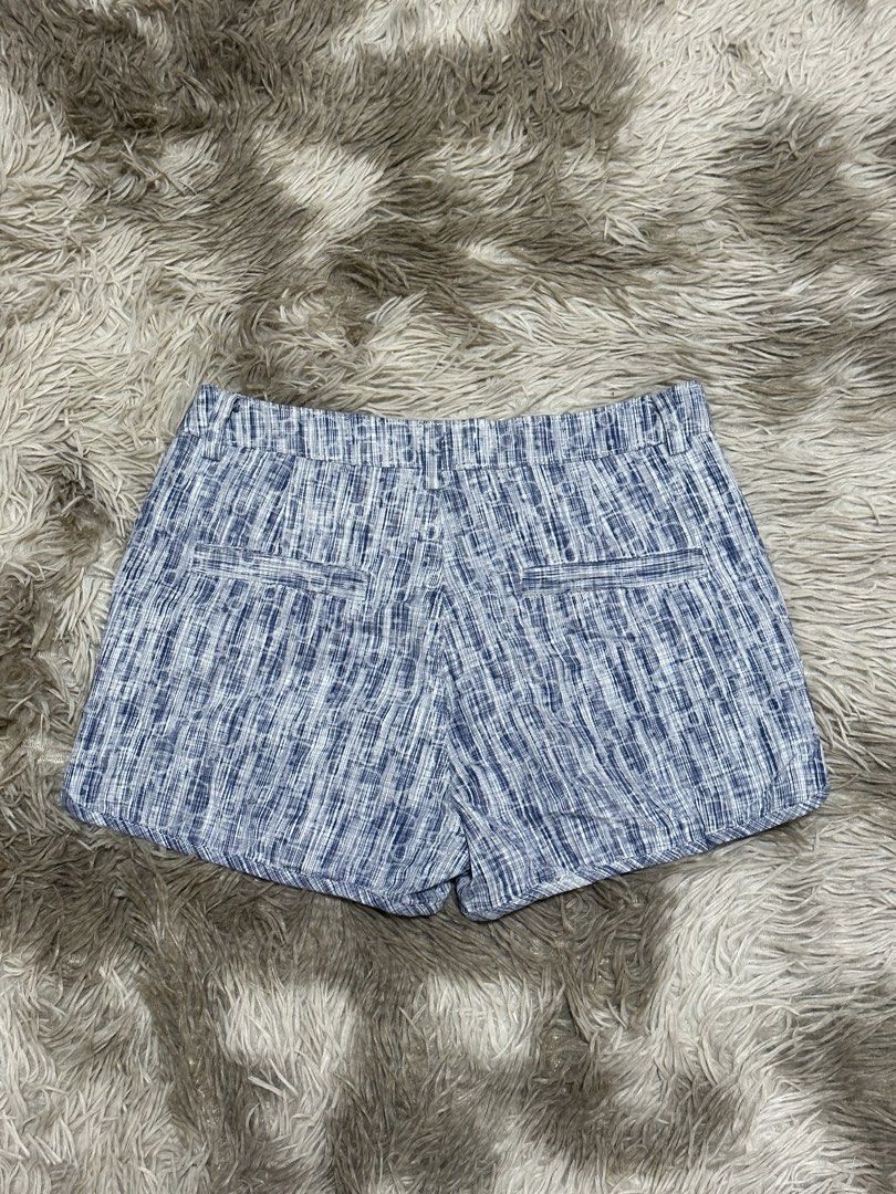 Christian Dior Blue White Patterned Cotton Shorts (Category: Shorts) located in General Santos City (Dadiangas). Submitted by darylvoid (Listing ID 1467088261, Image 2). Description: - Brand: Christian Dior - Color: Blue and White - Material: 100% Textured Cotton (Made in France) - Size: M (tagged at waistband) - Fit: Mid-rise with front button closure and belt loops - Pockets: Functional side pockets and two back welt pockets - Condition: Excell