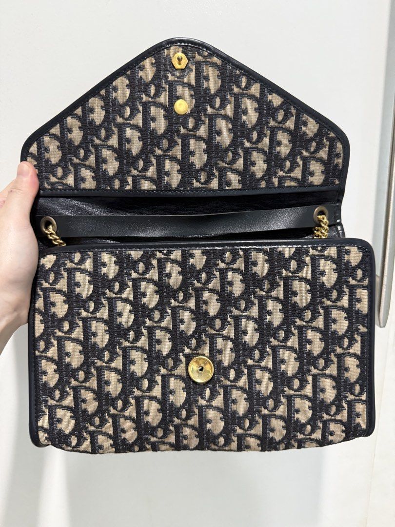 Christian Dior Trotter Monogram Envelope Shoulder Bag or Clutch Bag Vintage Bag (Category: Shoulder Bags) located in Quezon City. Submitted by lenitz (Listing ID 1467029259, Image 3). Description: *Authentic Christian Dior Trotter Monogram Envelope *vintage design *long or short Shoulder Bag *can also be a clutch bag *chains, leather, canvas are all in excellent condition *there is a bit smell of cabinet *front snap also working *vintage bag *can
