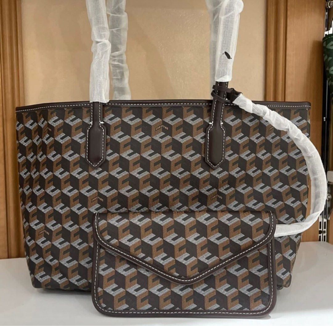 Christy Ng Tote Bag with Pouch Set (Category: Tote Bags) located in Manila. Submitted by mimi4373 (Listing ID 1467092594, Image 3). Description: CHRISTY NG - with box - good for gift giving - super b quality ✨ Colors available posted .