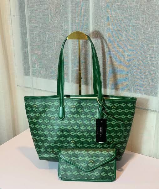 Christy Ng Tote Bag with Pouch Set (Category: Tote Bags) located in Manila. Submitted by mimi4373 (Listing ID 1467092594, Image 1). Description: CHRISTY NG - with box - good for gift giving - super b quality ✨ Colors available posted .