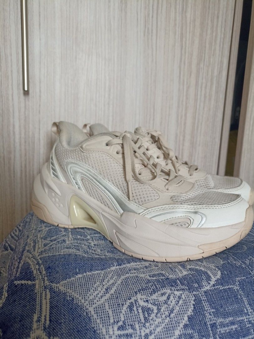 Chunky beige platform sneakers with mesh detailing (Category: Sneakers) located in Quezon City. Submitted by racsprelovedselling (Listing ID 1467059271, Image 2). Description: - Colorway: Cream and pastel pink with subtle metallic silver accents - Design: Chunky platform sneakers with breathable mesh panels and lace-up closure - Comfort: Thick rubber soles for extra height, support, and all-day wear - Condition: Worn a few times with minimal sign