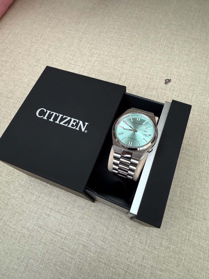 Citizen Tsuyosa Automatic Light Blue Dial Watch (Category: Men's Watches) located in Quezon City. Submitted by davidsgoodbuys (Listing ID 1467085672, Image 2). Description: - Model: Citizen Tsuyosa Automatic - Dial: Striking light blue with a clean layout - Features: Date window with magnifying lens and smooth automatic movement - Bracelet: Integrated stainless steel - Inclusions: Original black Citizen presentation box.