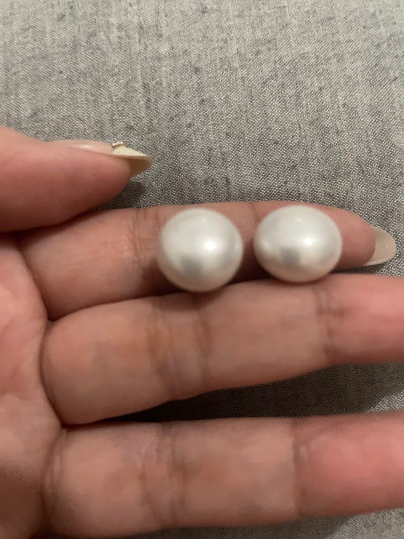 Classic White Pearl Stud Earrings FREE after purchase (Category: Earrings) located in Quezon City. Submitted by ladydianne8 (Listing ID 1467062501, Image 1). Description: - Elegant white pearl stud earrings with a clean, glossy finish ( 2 pairs) - Features secure gold-tone posts and comfortable clear plastic backings - Perfect size that sits comfortably on the earlobe ( pls refer to size reference with 1 peso coin in the photos) - Versatile desig