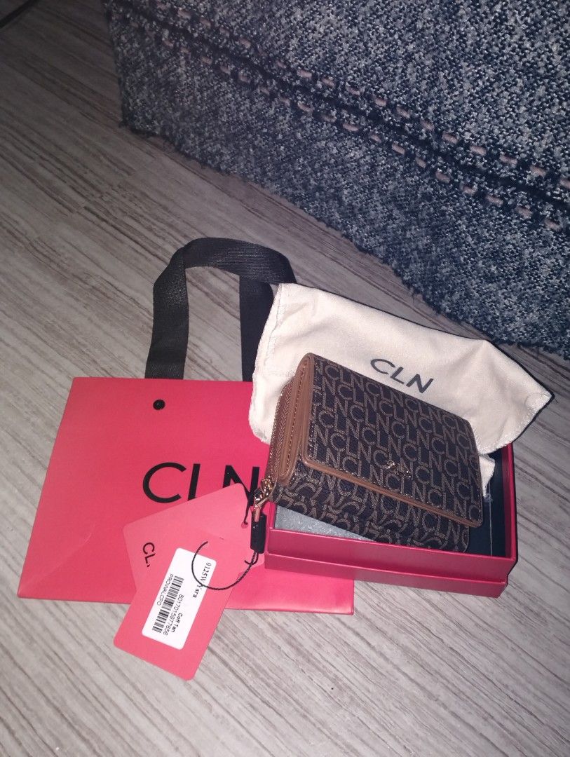 CLN Monogram Print Wallet in Tan (Category: Wallets & Card holders) located in Caloocan City. Submitted by newnrenewfinds (Listing ID 1467130540, Image 1). Description: - Brand: CLN - Color/Design: Classic tan with monogram print - Style: Tri-fold wallet with a secure zipped coin pocket - Condition: Brand new with store tags still attached - Inclusions: Original box, dust bag, and paper gift bag - Perfect for gifting or everyday use.