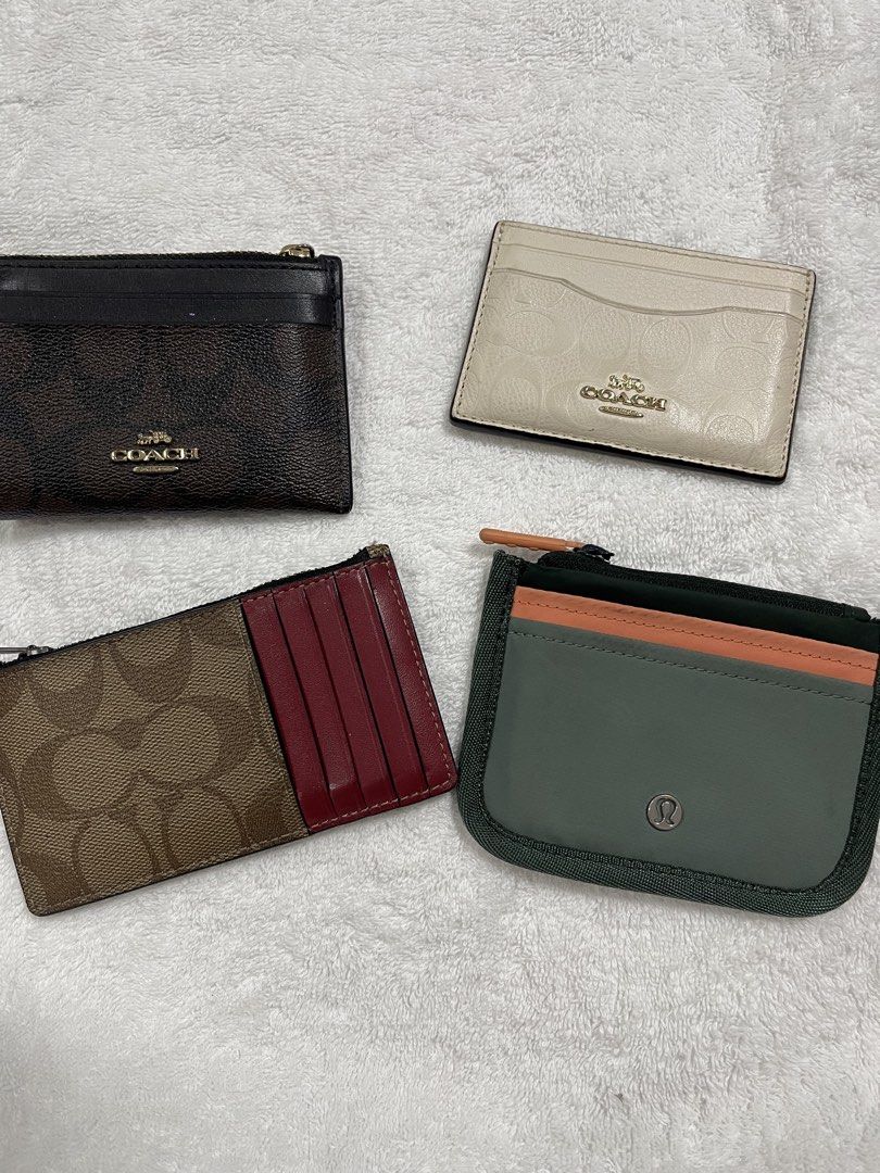 Coach and Lululemon Card Holder Wallets Assorted Collection (Category: Wallets & Card holders) located in Taguig. Submitted by 1307maloc (Listing ID 1467084335, Image 1). Description: - Set of 4 stylish card holder wallets - Includes 3 Coach designs: signature canvas, brown leather, and cream embossed leather - Includes 1 green Lululemon zippered pouch with orange trim and round logo zip pull - Multiple slots for cards, cash, and IDs - Secure zip