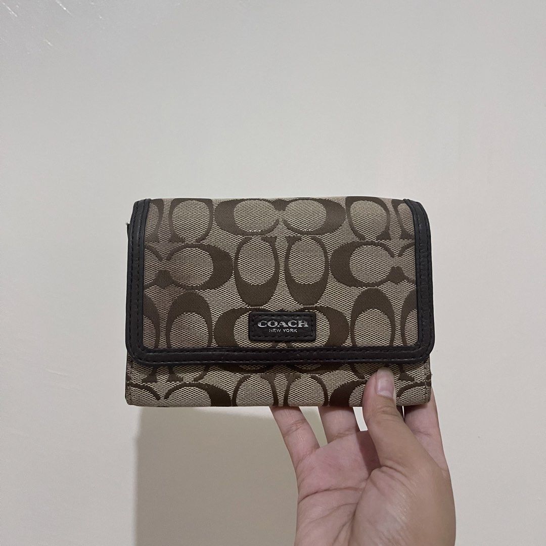 COACH Canvas Wallet (Category: Wallets & Card holders) located in General Santos City (Dadiangas). Submitted by mschic309 (Listing ID 1466994780, Image 1). Description: - with coach hangtag - small in size - mop: gcash - mod: direct j&t.