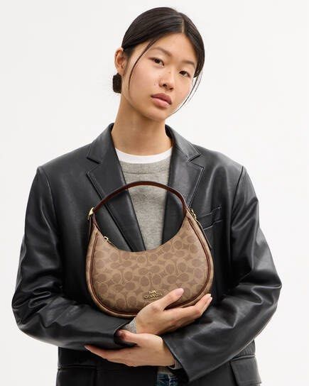 Coach Emily (Category: Clutches) located in Quezon City. Submitted by matchaaa_shop (Listing ID 1467147890, Image 2). Description: Bnew sealed Emily 💖 with tag and cc Original 💯💯💯 .