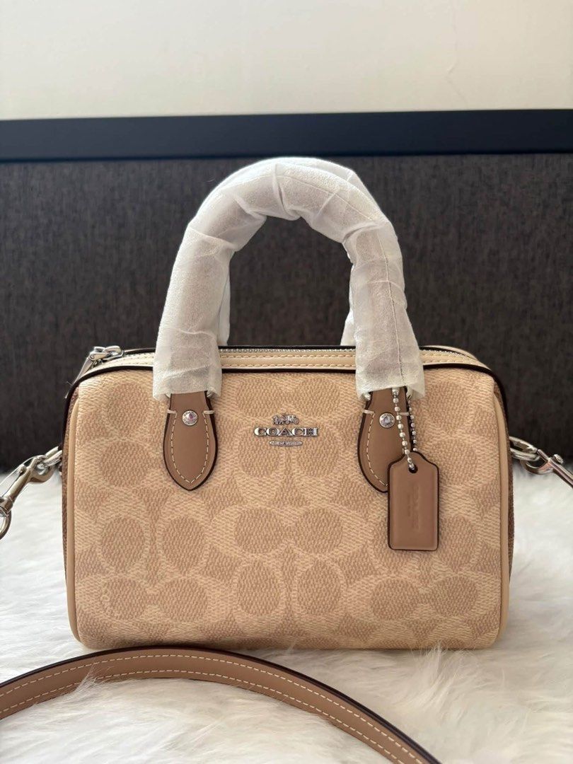 Coach mini rowan (Category: Shoulder Bags) located in Quezon City. Submitted by matchaaa_shop (Listing ID 1467146282, Image 1). Description: Bnew sealed !! Mini rowan with tag and cc Original ✅.