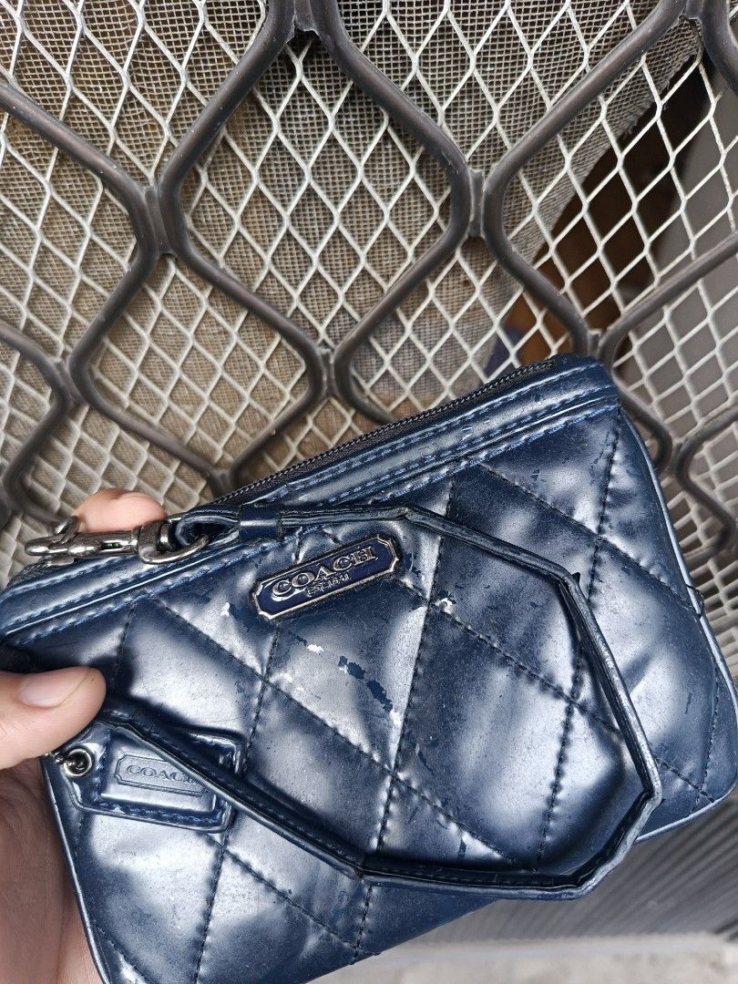 Coach Poppy Wrislet (Category: Purses & Pouches) located in Muntinlupa City. Submitted by eksenathriftshop (Listing ID 1467098576, Image 3). Description: Good Condition details and issue are posted.