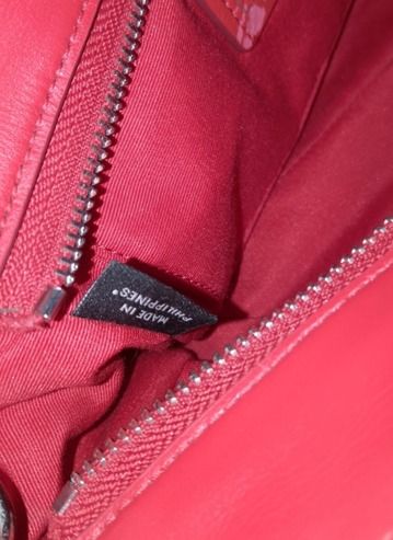Coach Red Croc Embossed Leather 2-way Bag (Category: Luxury Bags & Wallets) located in Caloocan City. Submitted by 11eleven.shop (Listing ID 1464531596, Image 3). Description: - Authentic Red Blake Carryall 25 Leather Bright Red - Luxurious Croc Embossed Leather - Top Handles & Detachable Crossbody Strap - Includes Original Coach Hangtag - Issue: Usual creed peeling. Very minimal rubs as seen emphasized on picture but not too visible upon inspect