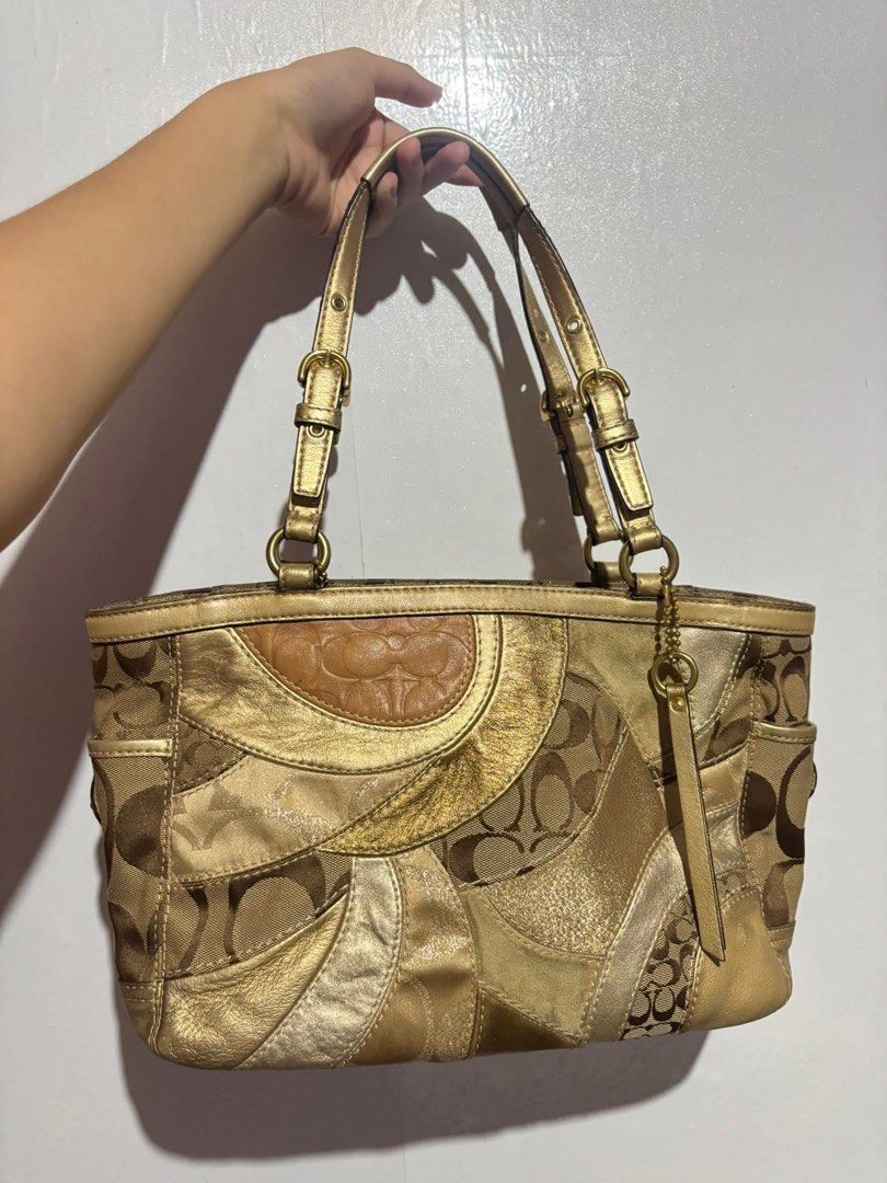 Coach Signature Patchwork Gold Tote Handbag (Category: Luxury Bags & Wallets) located in Manila. Submitted by dumayasque57133 (Listing ID 1467106940, Image 2). Description: - Authentic Coach signature patchwork tote bag - Metallic gold and brown tones with mixed jacquard fabric and metallic leather panels - Vibrant purple satin interior lining with a secure zip pocket - Double shoulder straps with adjustable buckle details - Includes original Coa