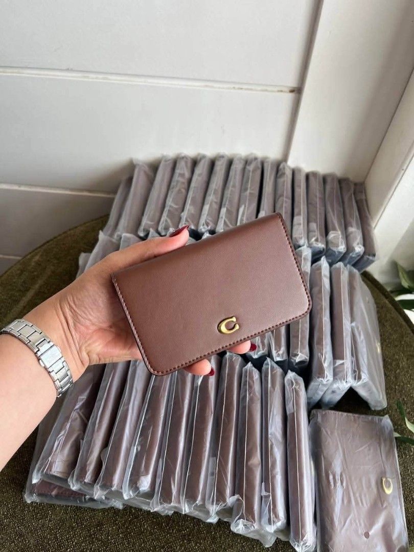 Coach Slim Cardcase in Maple (Category: Wallets & Card holders) located in Quezon City. Submitted by bagsboutiqueph (Listing ID 1467044139, Image 1). Description: LAST PRICE POSTED. LIMITED STOCKS! BRANDNEW WITH INCLUSIONS. COLOR MAY SLIGHTLY VARY IN ACTUAL DUE TO LIGHTING AND CAMERA SETTING. OTHER PHOTOS WILL BE SEND DURING PURCHASE AND FOR SURE BUYERS ONLY. WHEN IN DOUBT, DO NOT ORDER. THANK YOU..