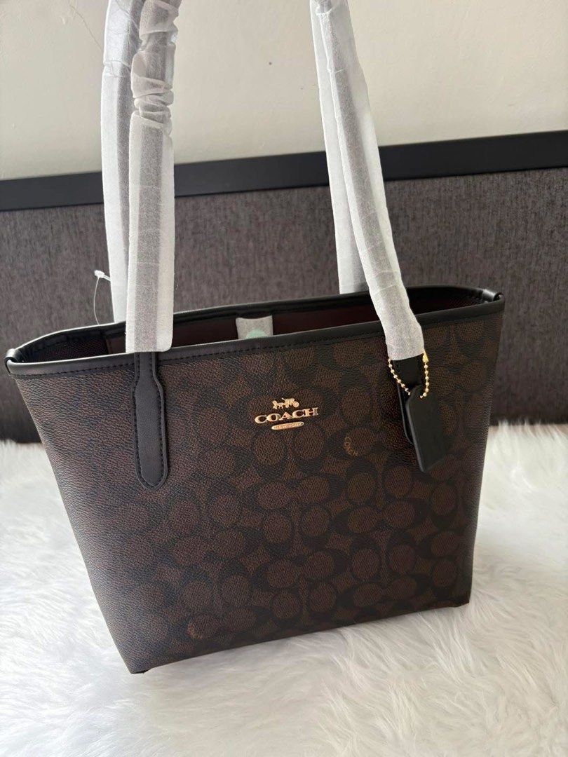 Coach Small City Tote (Category: Tote Bags) located in Quezon City. Submitted by matchaaa_shop (Listing ID 1467145478, Image 3). Description: Bnew sealed !!! Small city tote with tag and cc Original ✅ super benta nito mga mii 💖💚🧡.