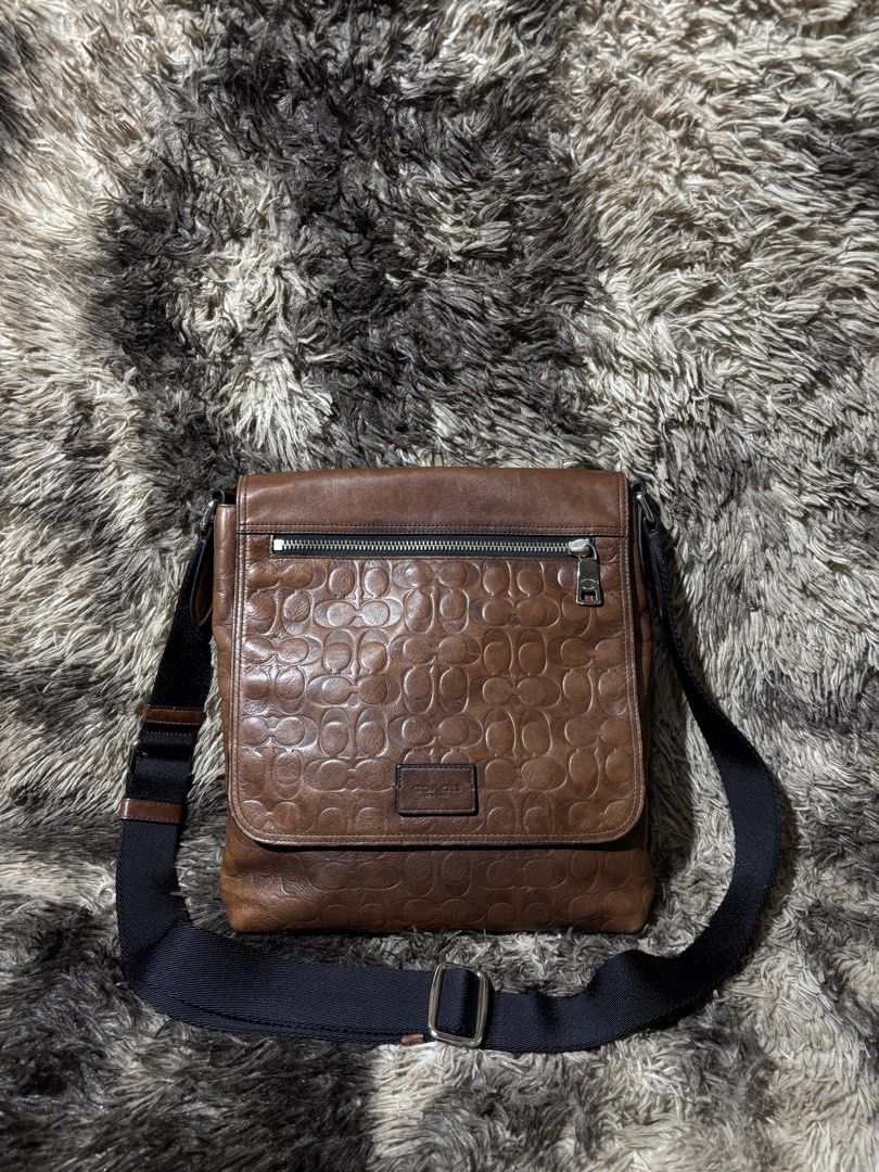 COACH SULLIVAN EMBOSSED MONOGRAM FLAP MESSENGER BAG (Category: Sling Bags) located in Valenzuela. Submitted by secret_closet_ph (Listing ID 1467061310, Image 2). Description: COACH SULLIVAN EMBOSSED MONOGRAM FLAP MESSENGER BAG AUTHENTIC RANK AB SIGN OF USE STILL PRESENTABLE 2,200 PESOS.