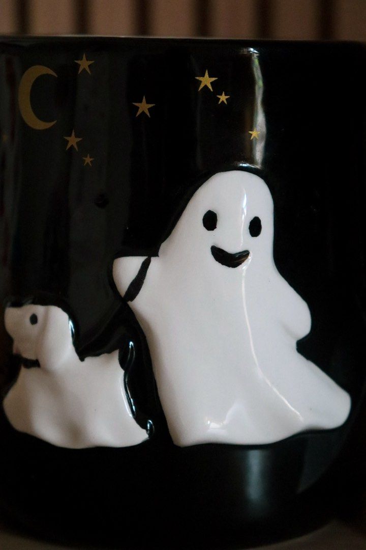 Cobwebs & Cauldrons Ghost & Dog Hand-Painted Mug (Category: Coffee & Tea Tableware) located in Marikina City. Submitted by hellolei_c (Listing ID 1467034125, Image 2). Description: • Cobwebs & Cauldrons • 3D Embossed Ghost & Ghost Dog with gold stars and crescent moon • Hand-painted glossy ceramic • 100% Brand New with original hanging store tag & sticker Great as a Halloween gift, desk decor, or daily coffee mug 👻 .